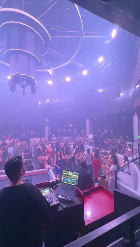 DJ booth overlooking guests on the dance floor and VIP lounge booths at Ora Club Dubai Night club